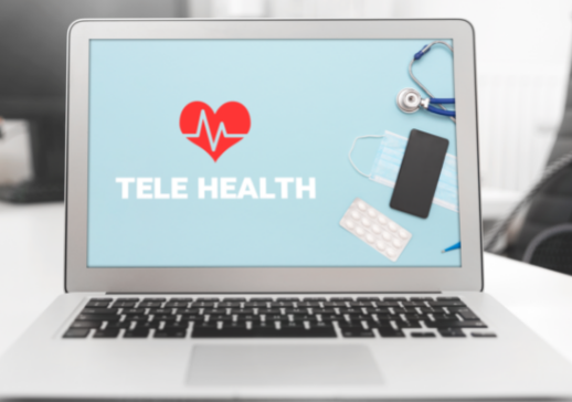 laptop with telehealth written on the screen
