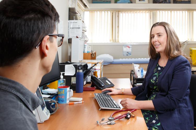 Dr McMullen with a patient in her practice 