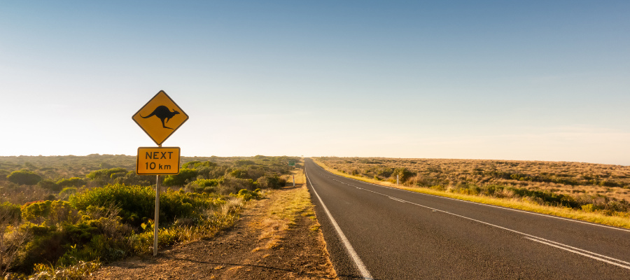 Rural Australian road with kangaroo road sign