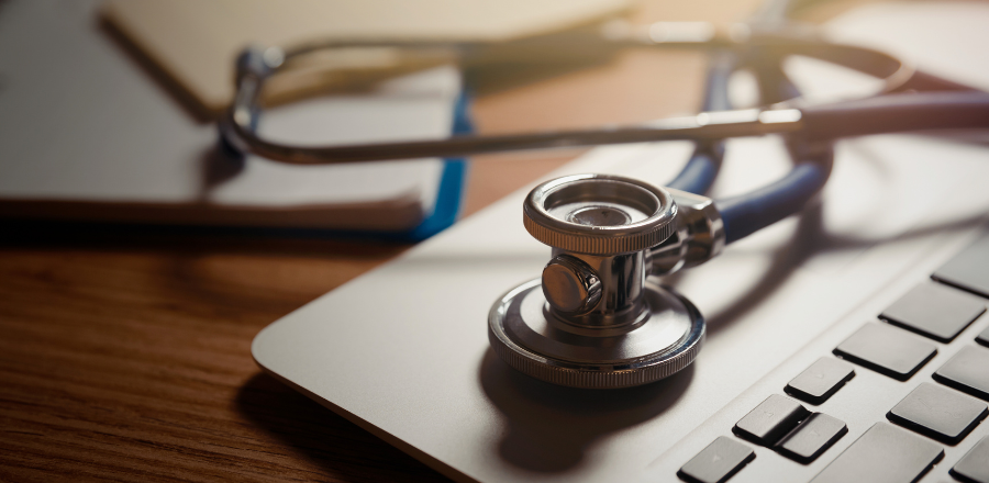 Close-up image of stethoscope on a computer