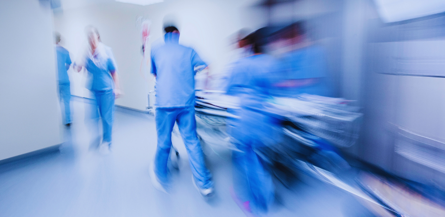patient being rushed through hospital