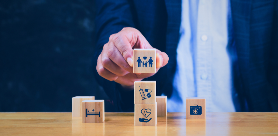 Private health insurance concept blocks