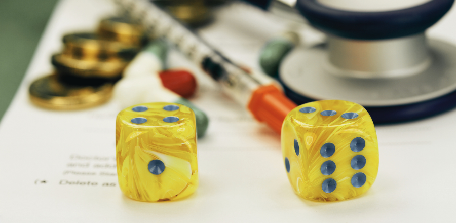 Dice, syringe, and stethoscope