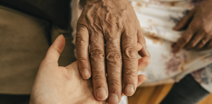 Older hand on younger hand