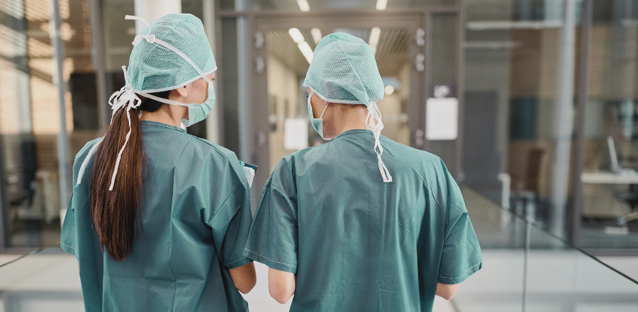Doctors in scrubs talking
